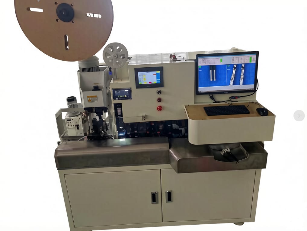 Terminal crimping and insertion machine
